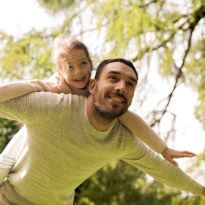 parent and child enjoying the outdoors photo