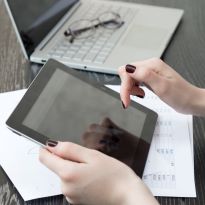 photo of person with tablet