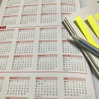 calendar with papers on it