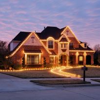 Home decorated in holiday lights