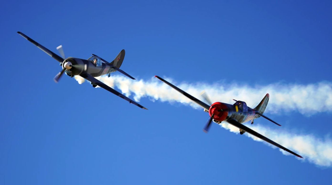 Two planes side by side in the air