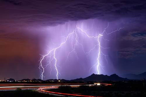 Lightning flashes over the desert. www.istockphoto.com/portfolio/mdesigner125