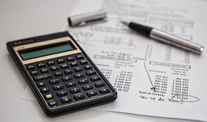 Calculator and financial paperwork